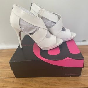 Michael Antonio white heels. (Never worn)